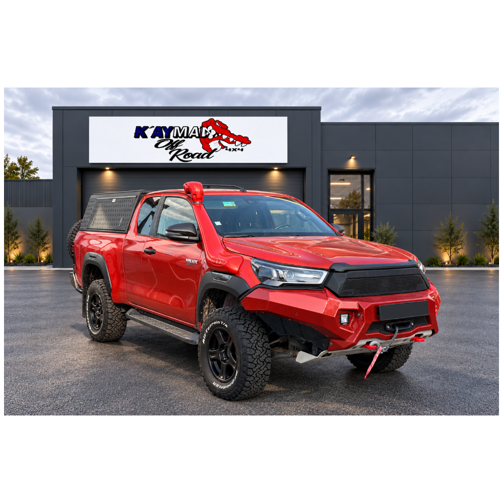Toyota Hilux Invincible Extra Cab 2.8 D-4D 204 ch BVA – Préparé Raid / Overland – Orange – 2021
